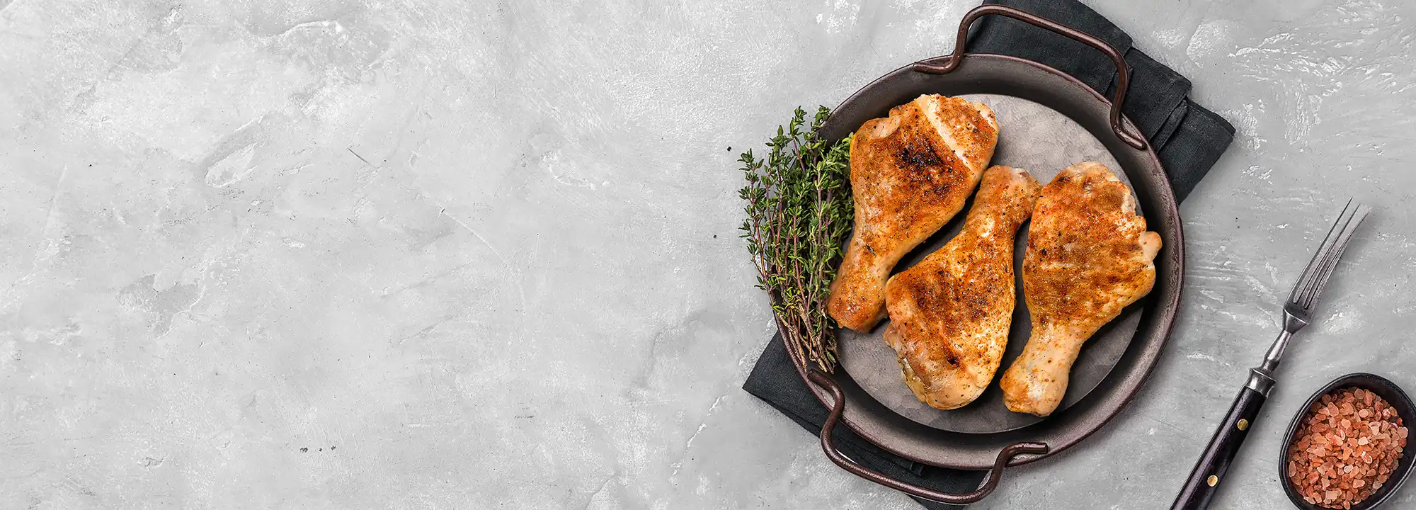 Baked chicken drumsticks served as a main dinner course, perfect for a simple homemade family meal.